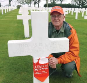 Netherlands David Lyle ’68, M ’79 honored fallen Clemson alumni with Tiger Rags at the Netherlands American Military Cemetery.