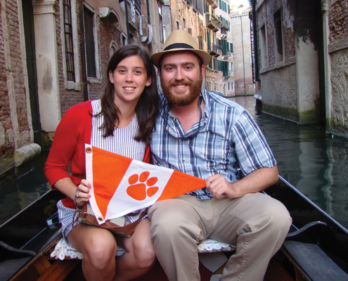 Italy Paige Gainey ’15 and Austin Nettles ’13 show their Tiger Spirit while relaxing on a gondola ride in Venice.