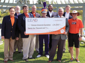 Pictured are (from front left) Richard Goodstein, dean, College of Architecture, Arts and Humanities; Tom Waldrop, CUTBA president; Drew Bismack, Tiger Band member and CUTBA student board member; Brian O’Rourke; associate vice president, University Advancement; and Mark Spede, Tiger Band director; (back left) Tony Stapleton, CUTBA founding member; Larry Sloan, CUTBA founder; LaRon Stewart, CUTBA board member; Walter Betsell, CUTBA board member.