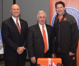 Joe Swann (center) with President Clements and Coach Brownell.