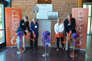 Members of the Barnes family cut the ribbon for the Barnes Center.