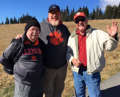 Graham Abbott ’56 and his son Graham happened to run across Larry Grimes, emeritus professor of applied economics and statistics, in Olympic National Park.