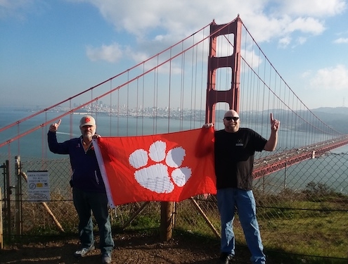 California: Harry Childs ’89, right, and Oscar Outen rep the Tigers in San Francisco during a trip to see the National Championship.