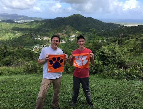 Puerto Rico: Father and son, Christopher ’90 and James ’20 Dickey, near Patillas during an UMCOR mission trip for hurricane repair in the area.