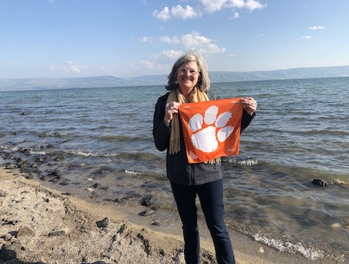 Israel: Kay Lindsay Sporrer ’82 on the shores of the Sea of Galilee in Tiberias. “This sea is mentioned many times in the Bible, but probably the most well-known is when Jesus and Peter walked on water.”