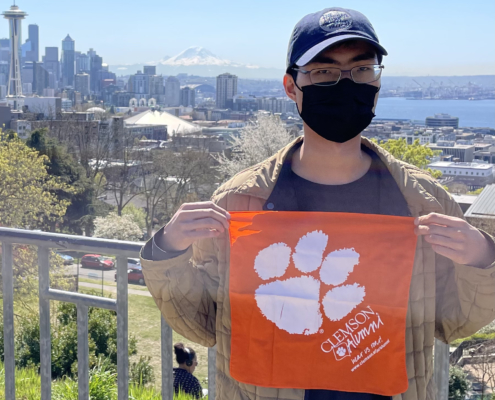 Washington: Steven Tran ’15 visited downtown Seattle, posing for a picture with his Tiger Rag in Kerry Park.